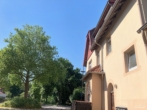 Ansicht - Mehrfamilienhaus mit Werkstatt in Neustadt am Rügenberge