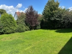 Pflegeleichter Garten - Lichtdurchflutetes Einfamilienhaus in bester Lage mit Garage