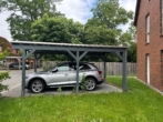 Carport - Gehobene Erdgeschoss Eigentumswohnung mit Garten in Burgwedel
